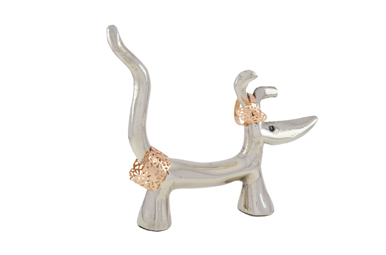 a silver statue of a dog