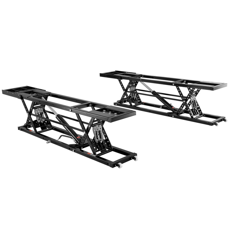 a pair of black metal tables