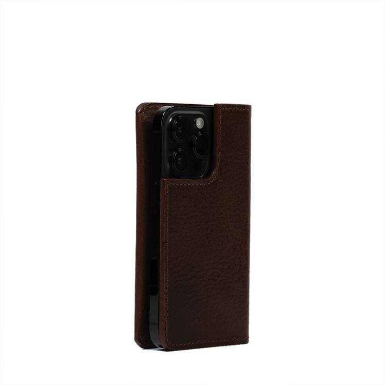 a cell phone in a leather case