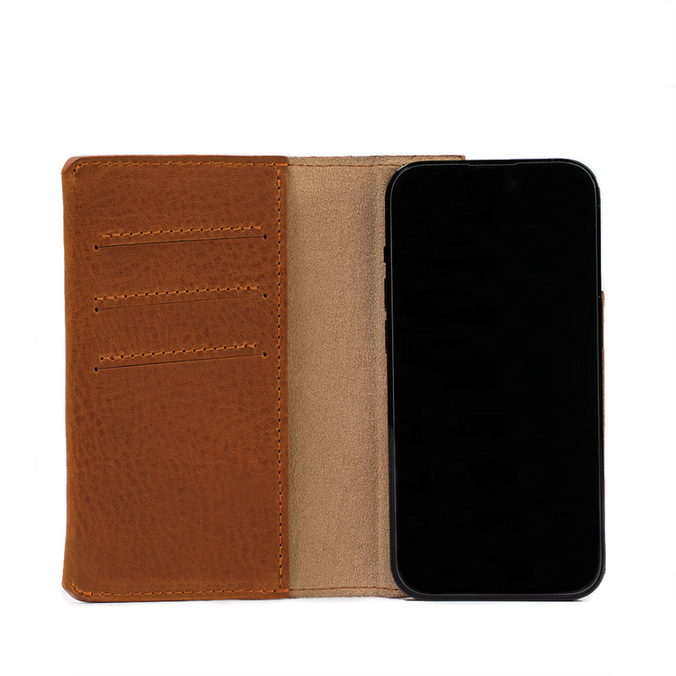 a cell phone in a leather wallet