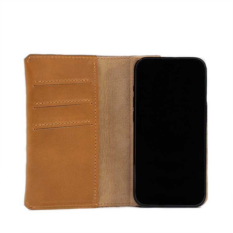a cell phone in a leather wallet