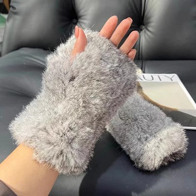 a hand with a furry finger