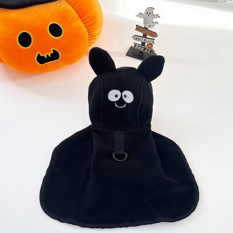 a black cloth with a face on it