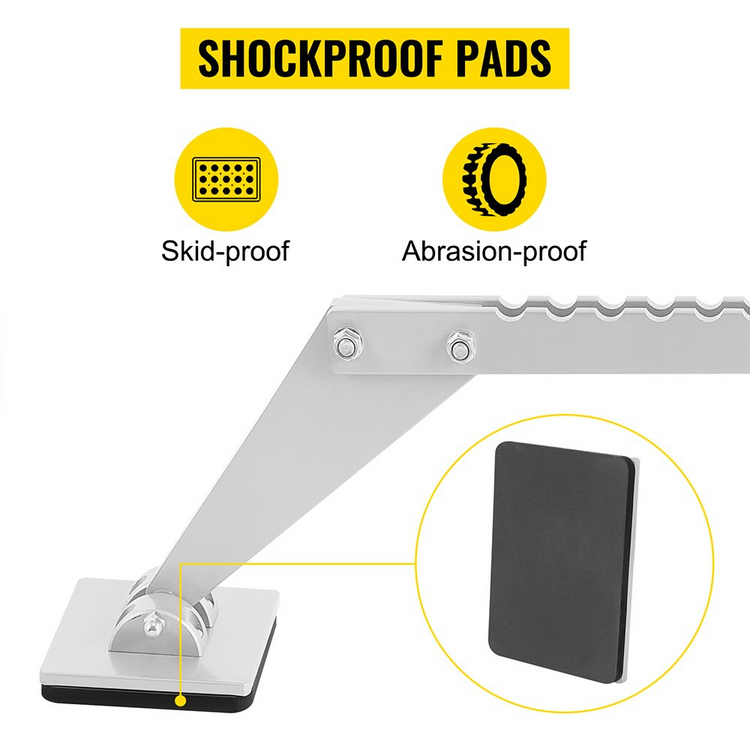 a metal stand with a black rubber pad