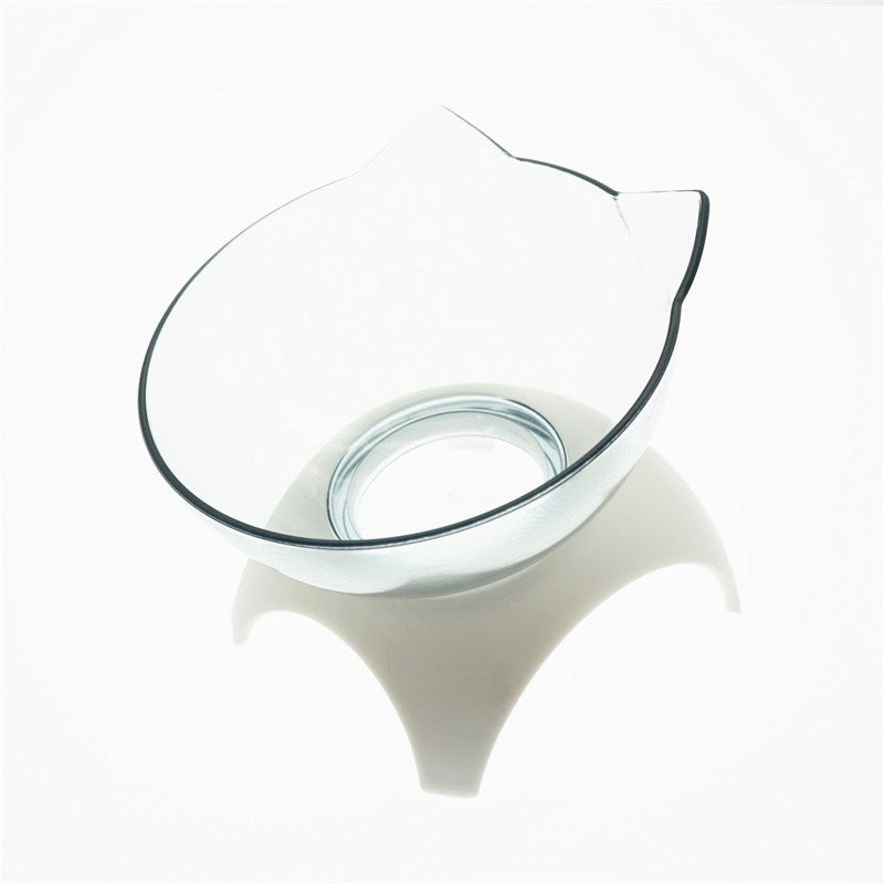a glass bowl on a white stand