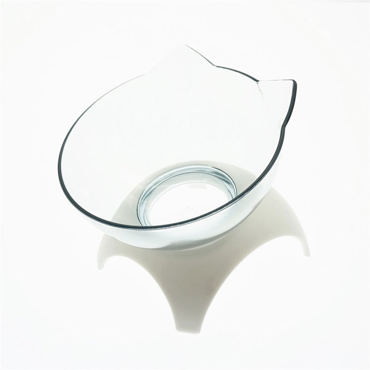 a glass bowl on a white stand