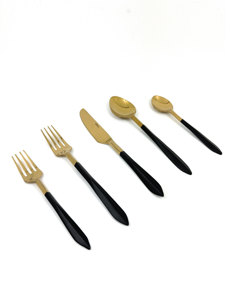 a group of gold and black cutlery