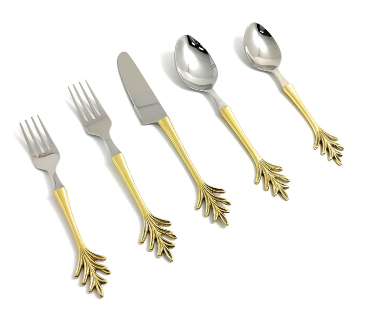 a silverware with gold handles