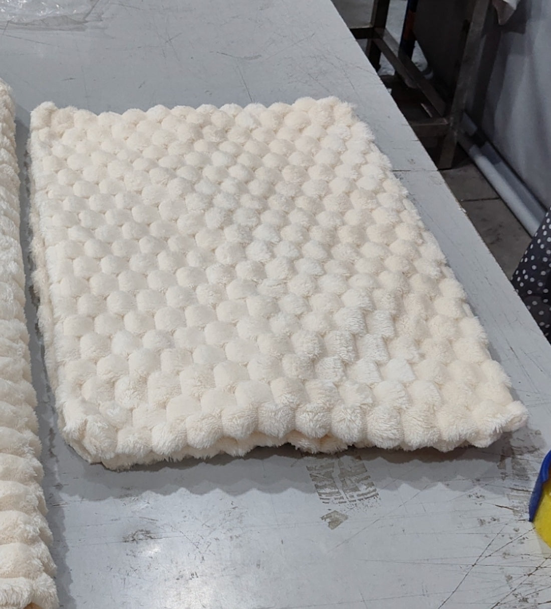 a white blanket on a table