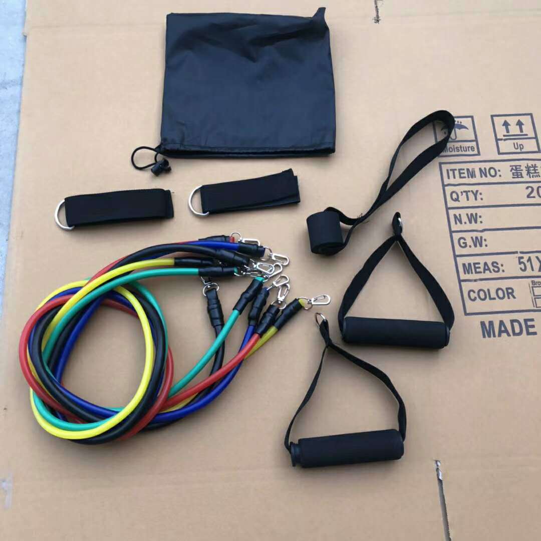 a group of colorful elastic bands and straps on a cardboard box