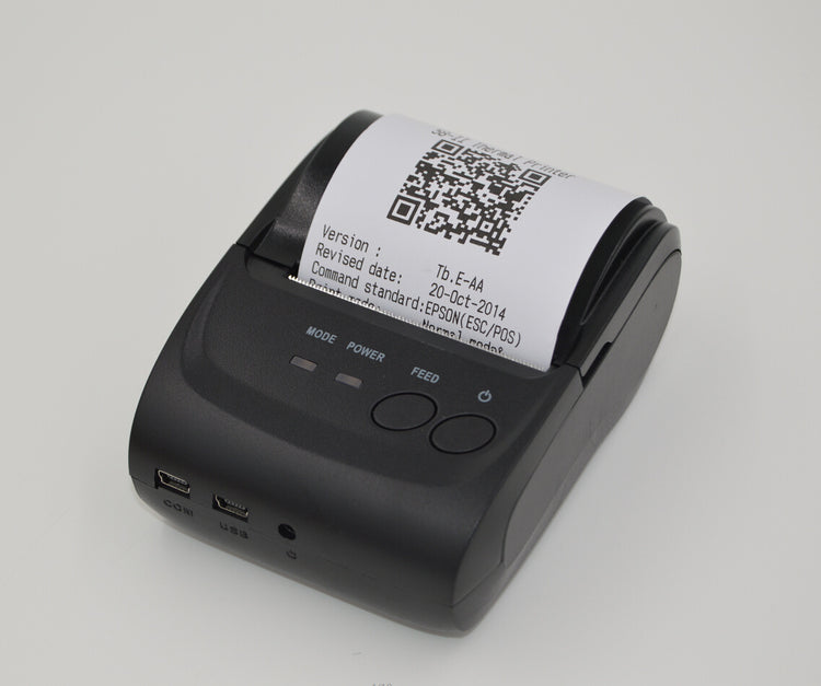 a black printer with a white label