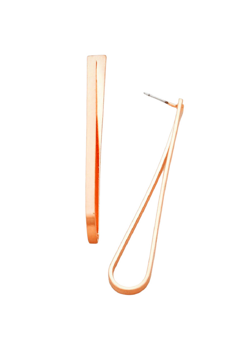 a pair of gold earrings