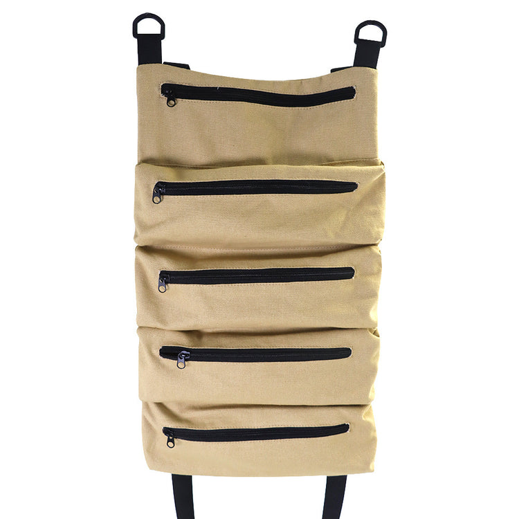 a tan bag with zippers