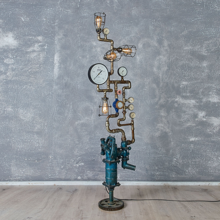 a steampunk lamp with gauges and pipes