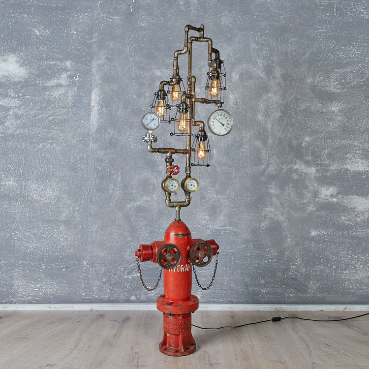 a red fire hydrant with a clock and gauges