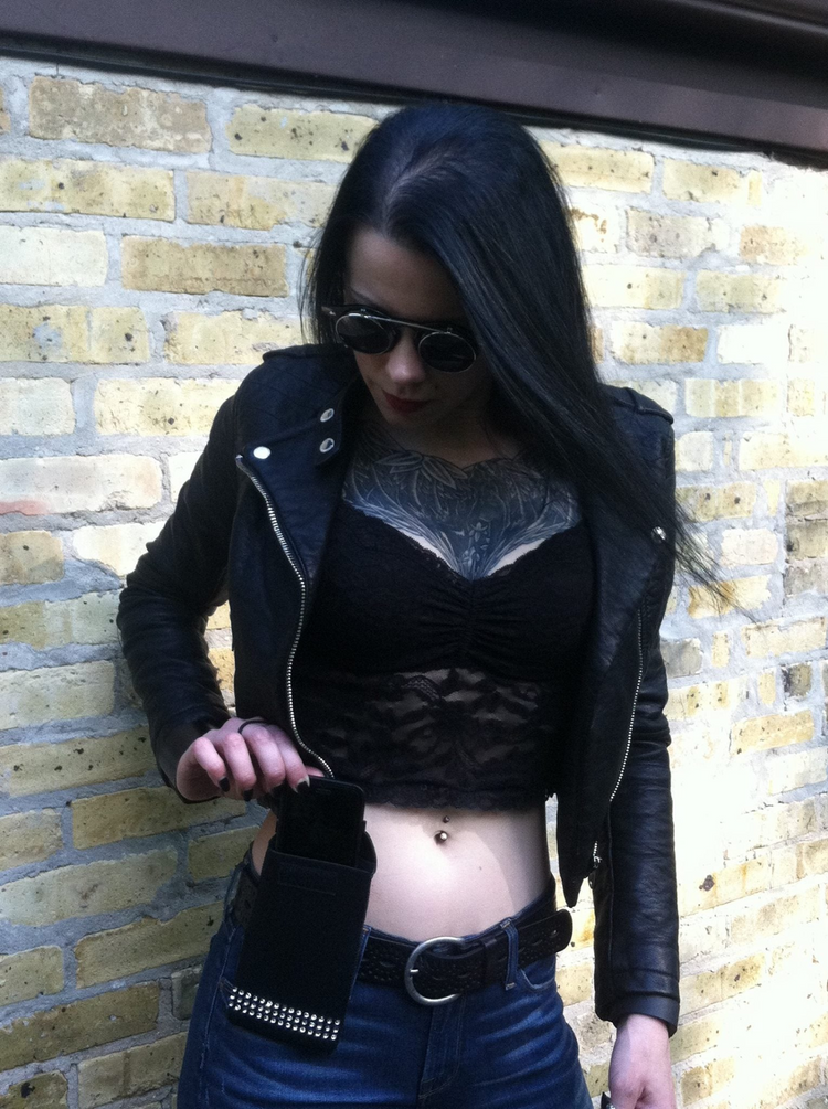 a woman in a leather jacket