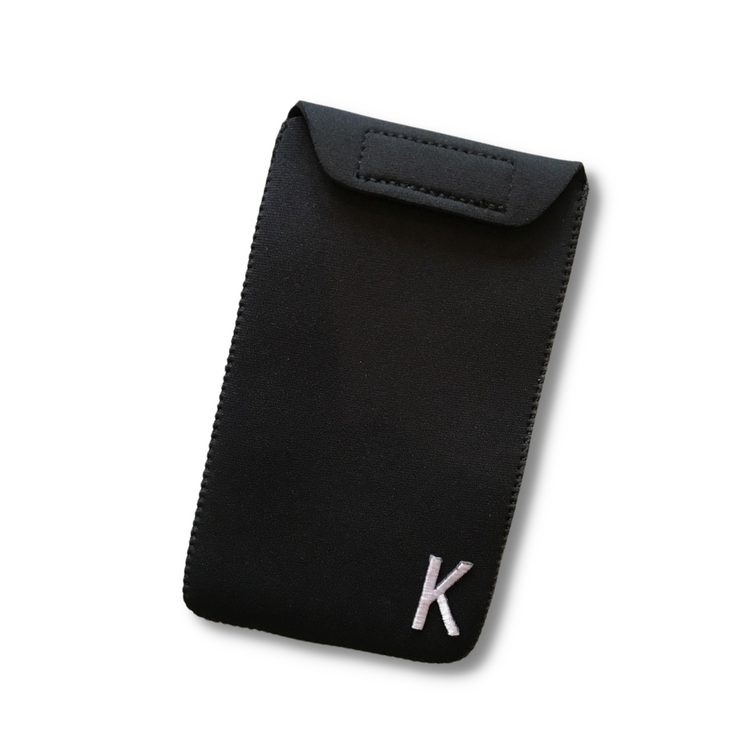 a black case with a white letter on it