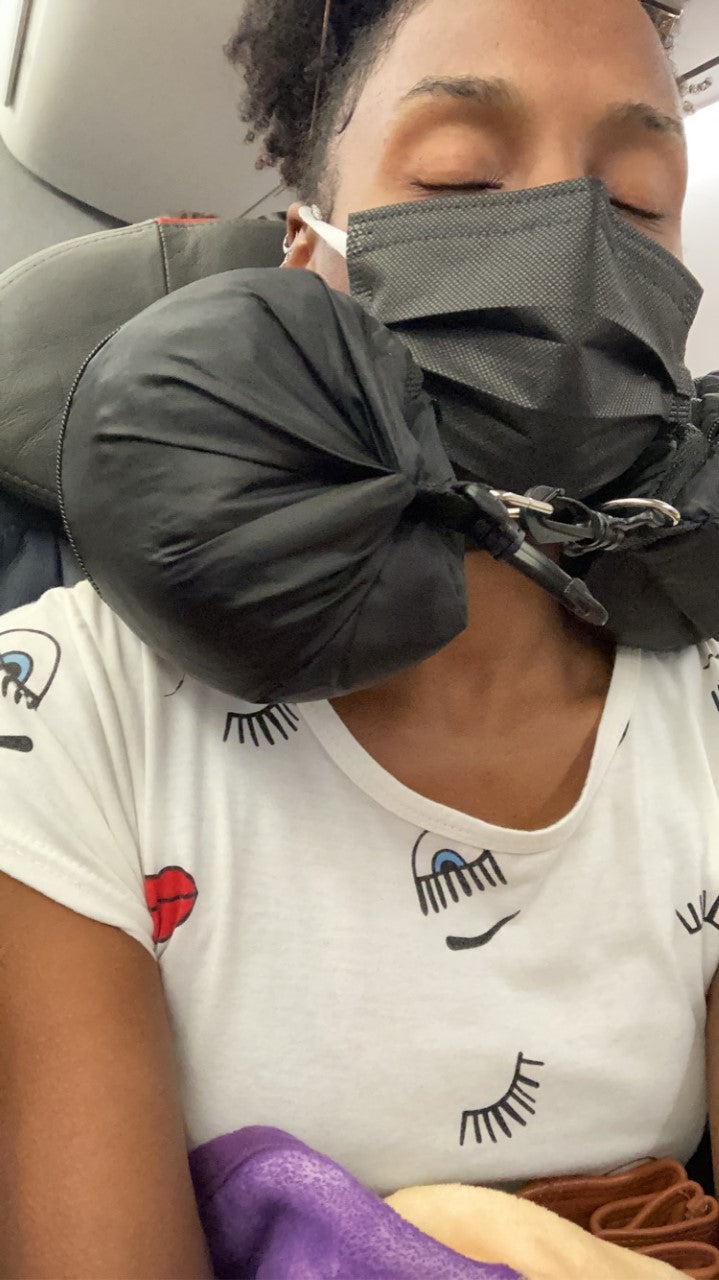 a person with a black bag on their head