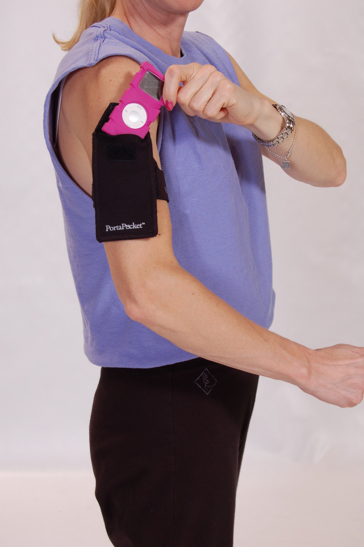 a person wearing a purple shirt and black pants