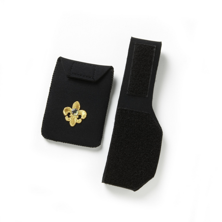 a black fabric pouches with a gold fleur-de-lis design