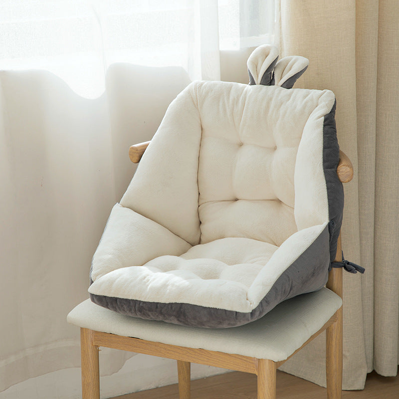 a chair with a pillow on top