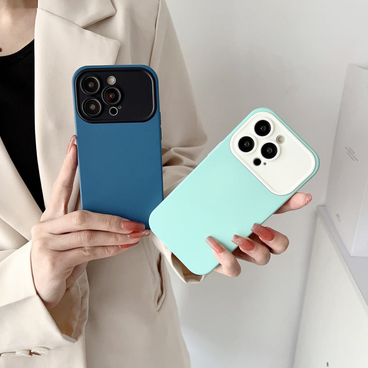 a woman holding a cell phone
