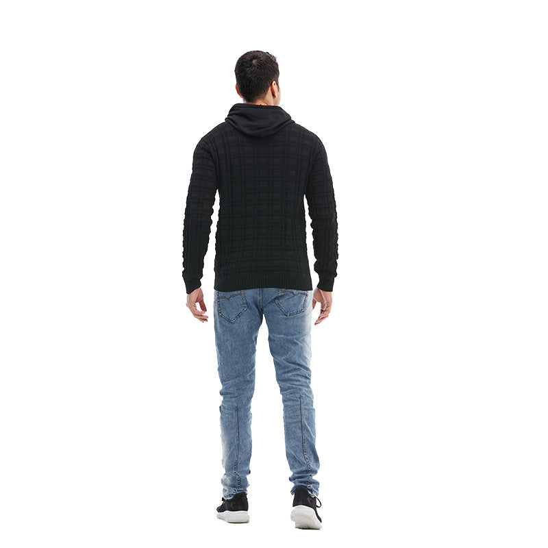 a man in a black sweater