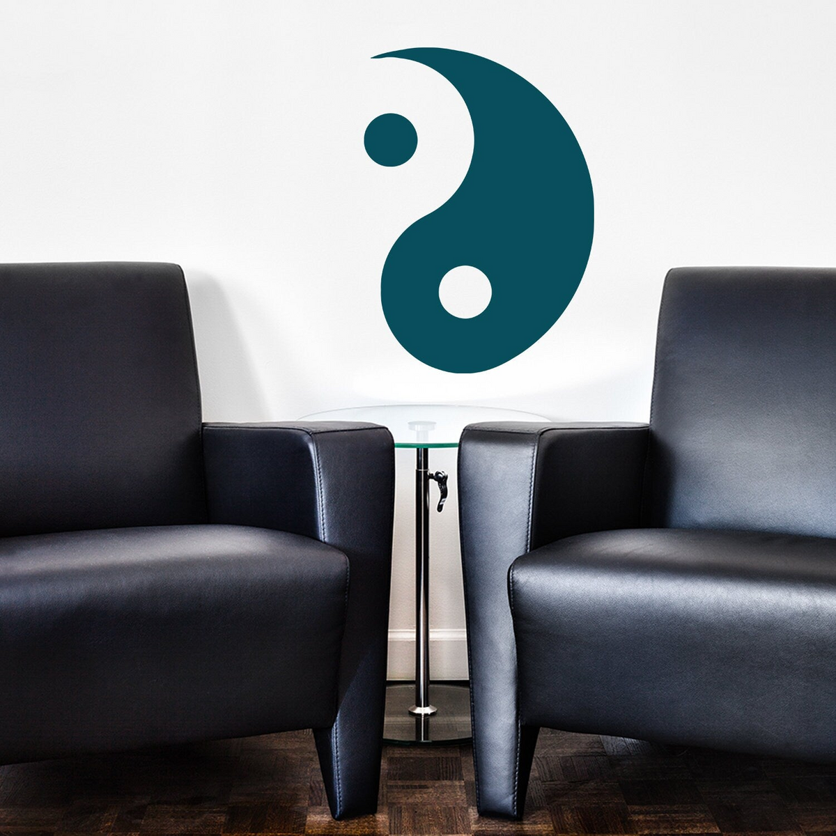 two chairs next to a table