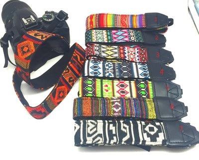 a camera strap with different designs