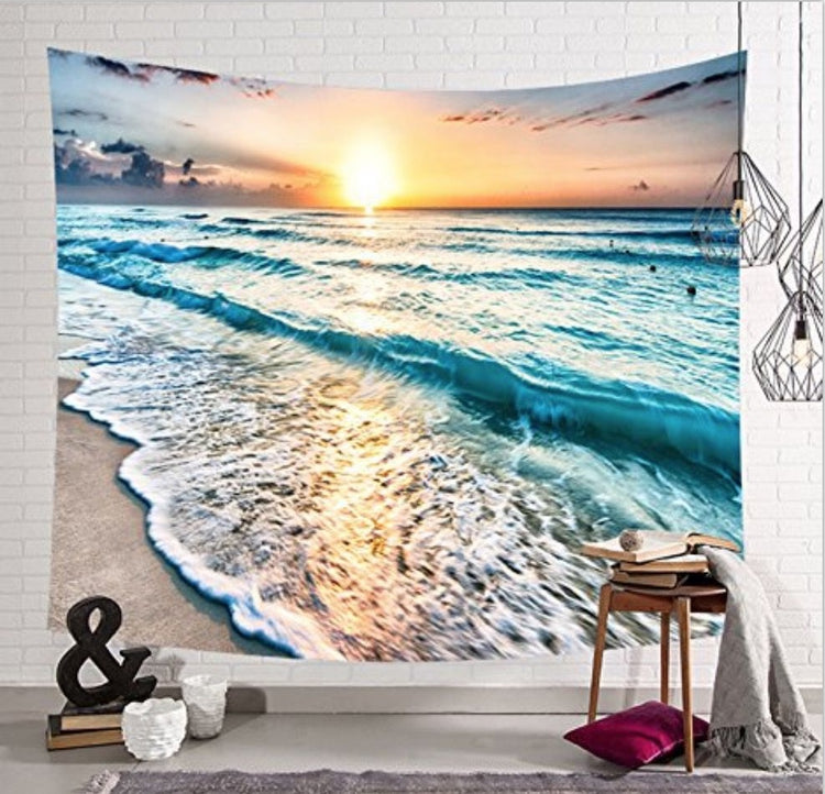 a tapestry with a sunset over the ocean