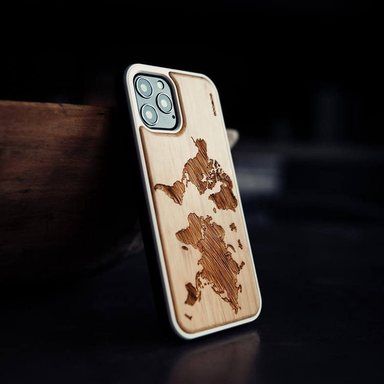 a cell phone case with a world map engraved on it