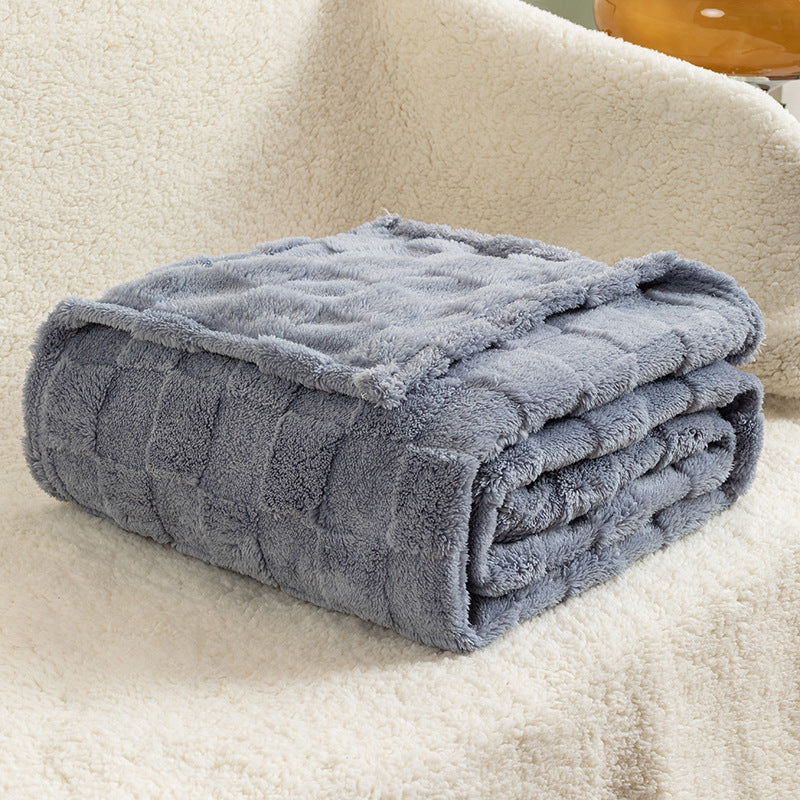 a blanket on a white surface