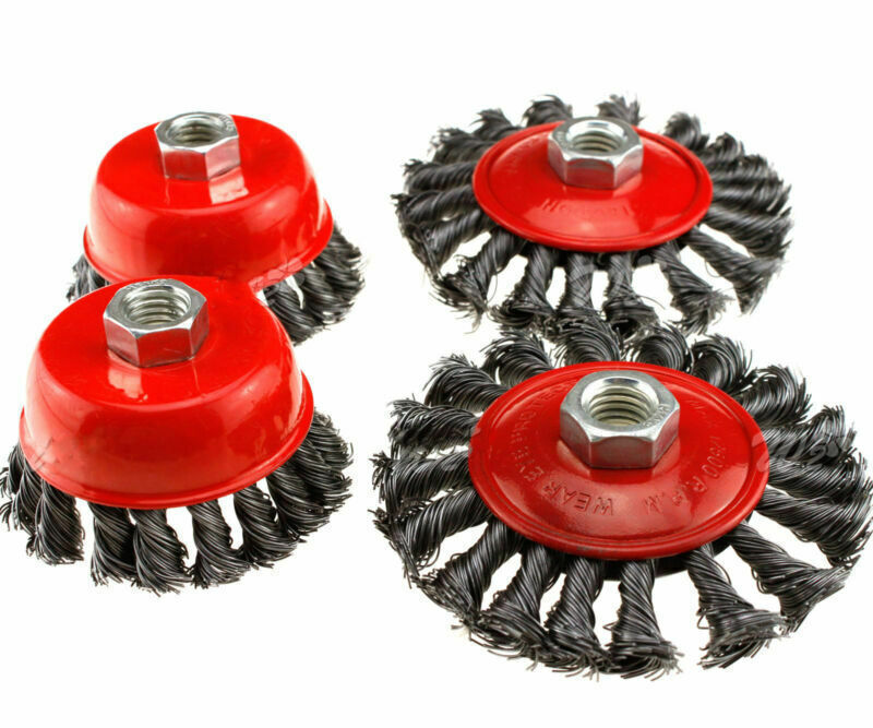 a group of metal brushes with red handles