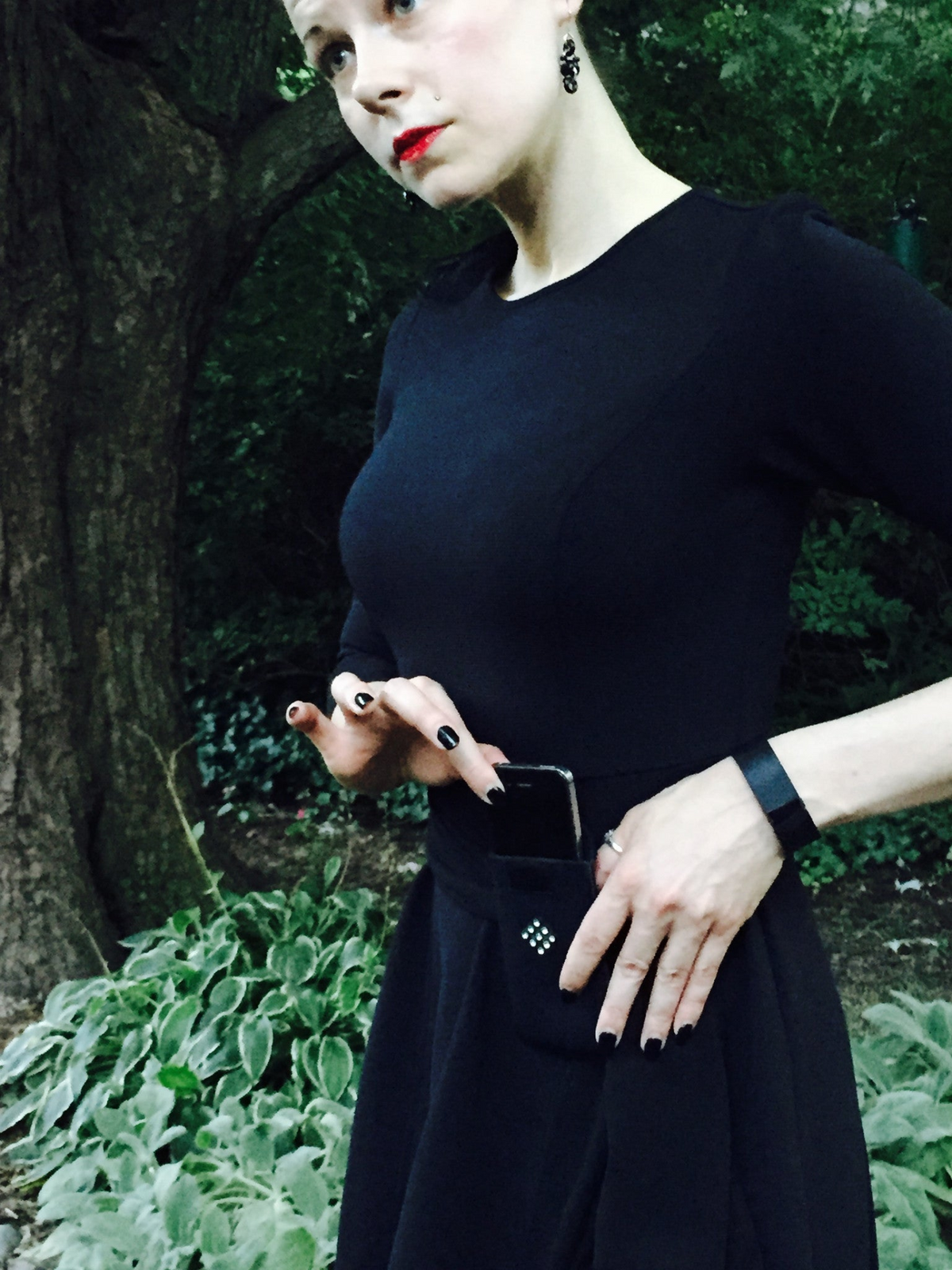 a woman in a black dress
