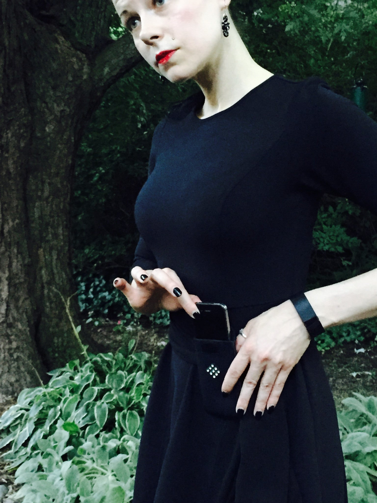 a woman in a black dress