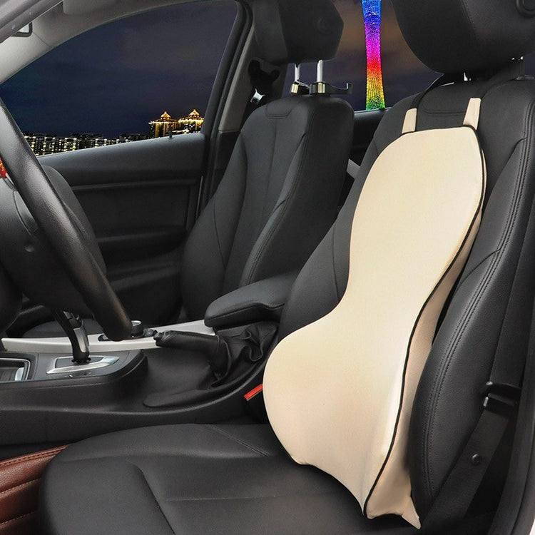a pillow on the seat of a car
