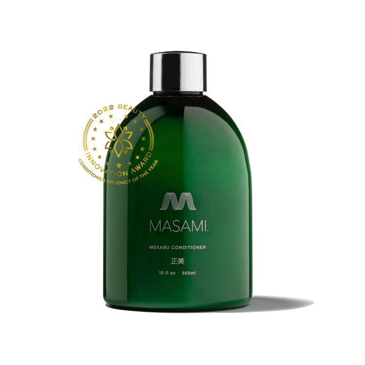 a green bottle with silver cap