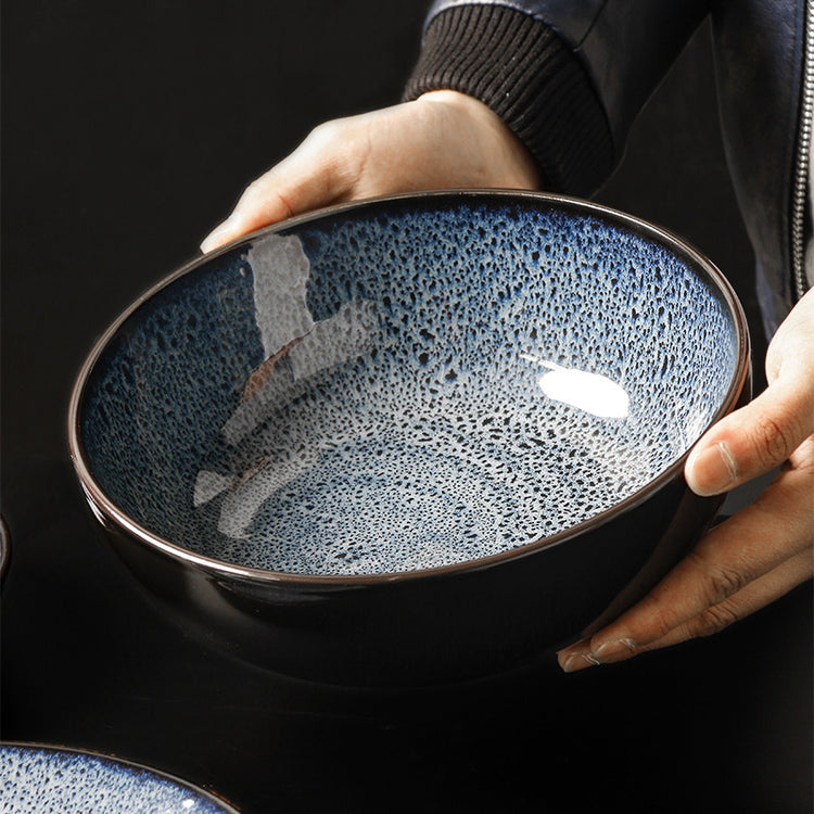 a person holding a bowl