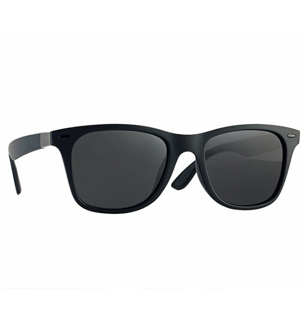 a black sunglasses with grey lenses