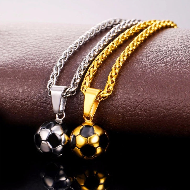 a group of necklaces on a leather surface