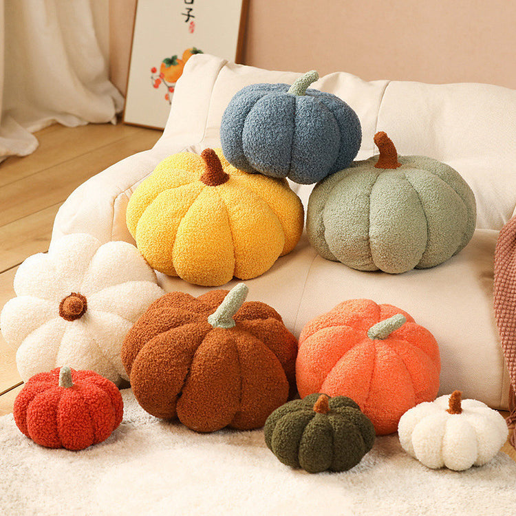 a group of pumpkins on a couch