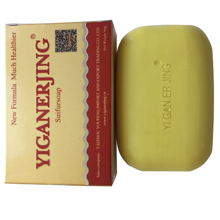 a bar of soap next to a box