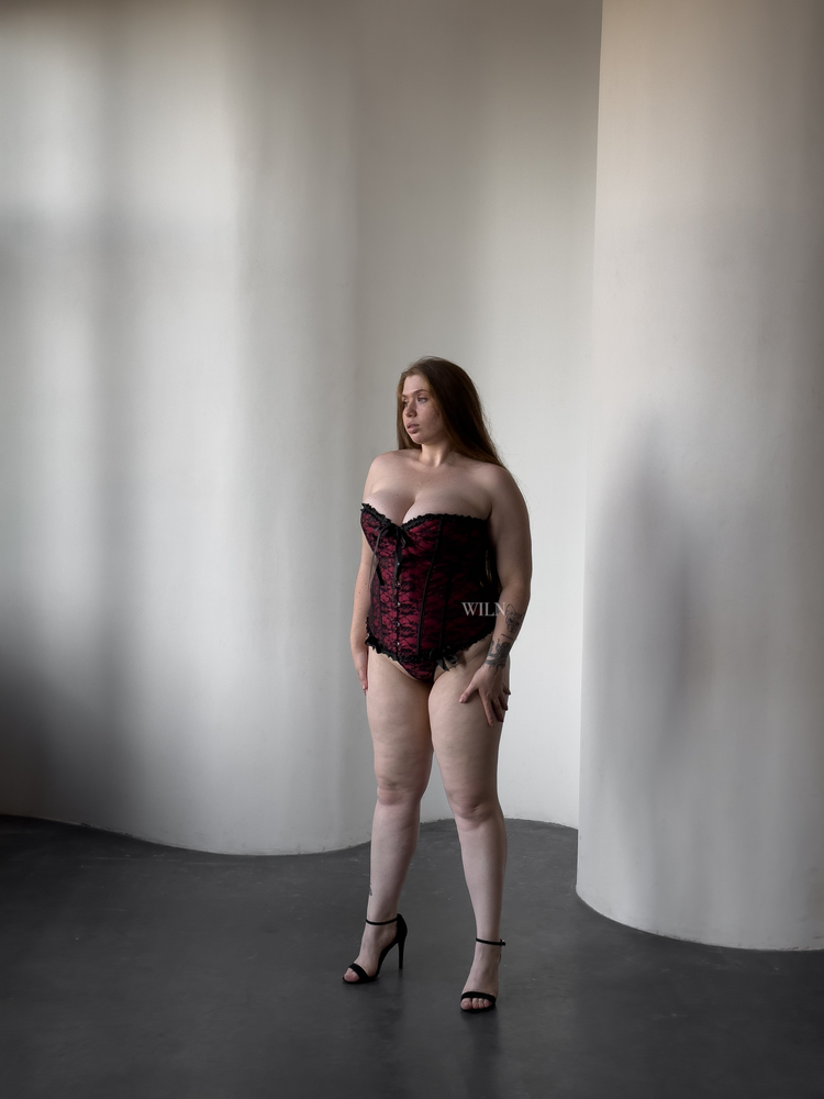 a woman in a corset