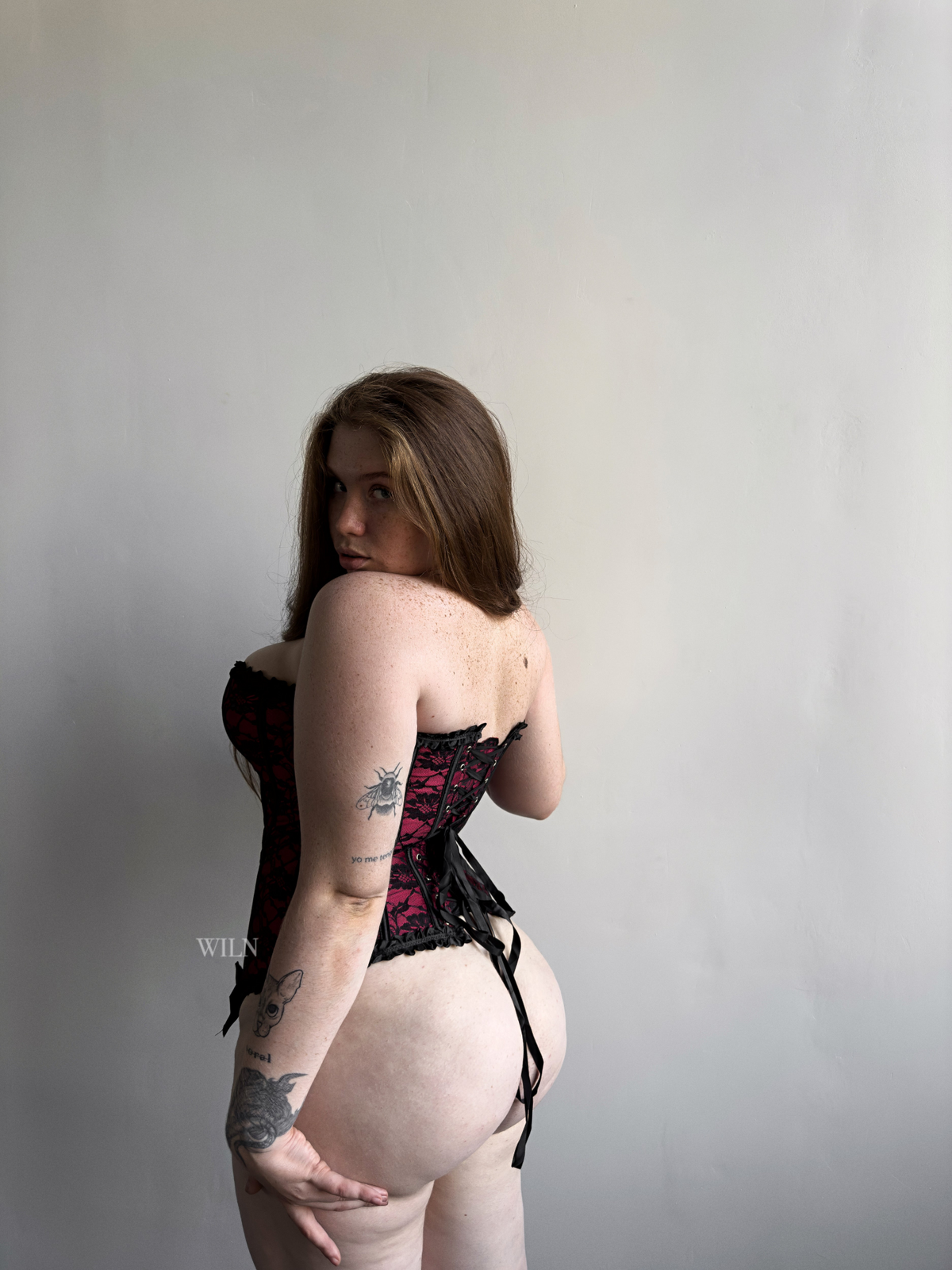 a woman in a corset