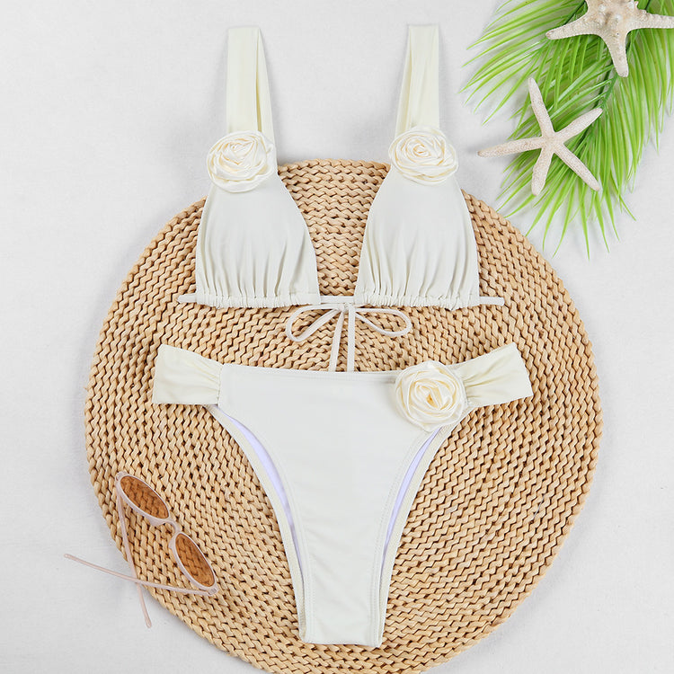 a white garment and sunglasses on a round straw mat