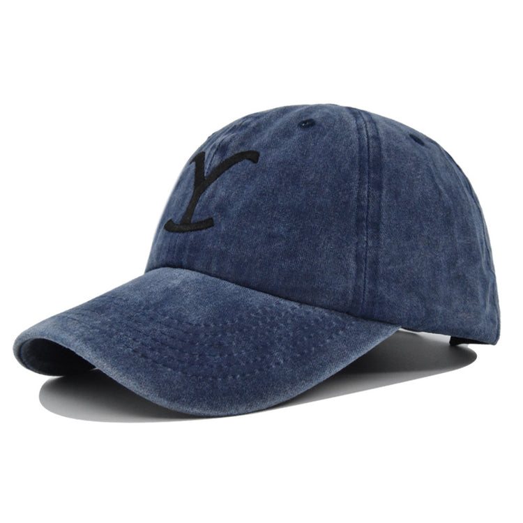a blue hat with a black y on it