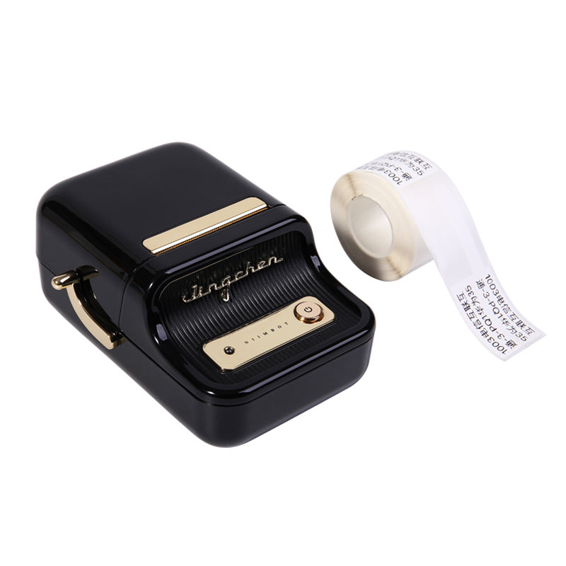 a black and gold tape dispenser