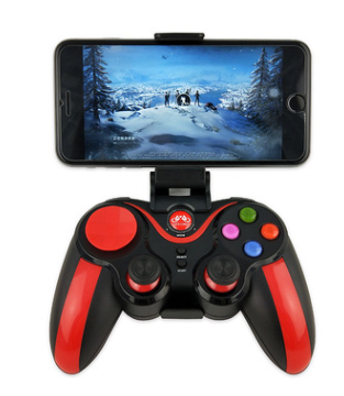 a black and red game controller with a phone on the screen