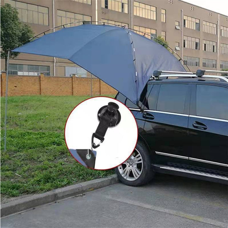a car with a blue tent attached to it