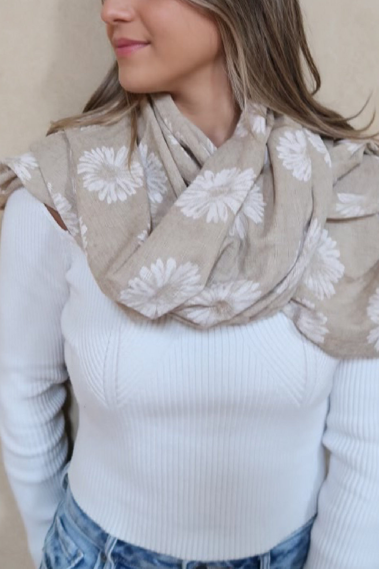 a woman wearing a scarf